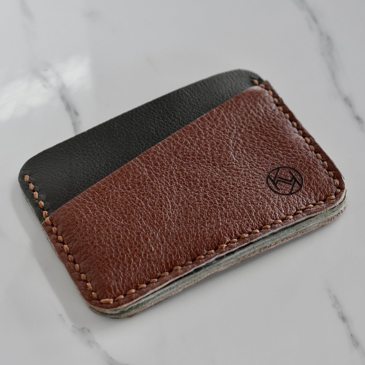 Beautifully hand made genuine leather card holder. Perfect gift idea for a man or women - it can store up to 6 cards.