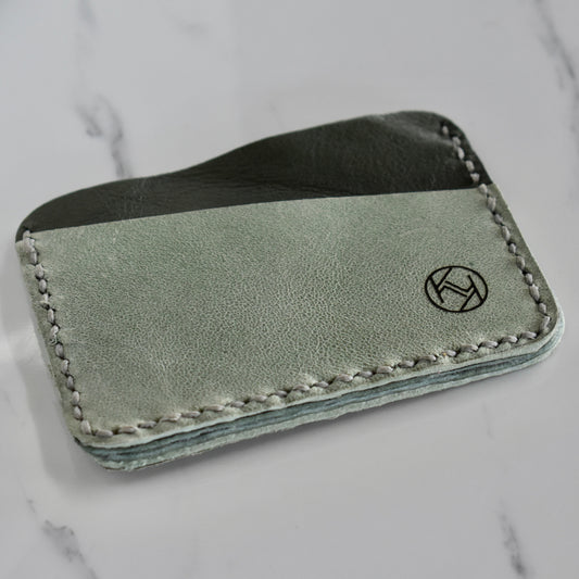 Beautifully hand made genuine leather card holder. Perfect gift idea for a man or women - it can store up to 6 cards.