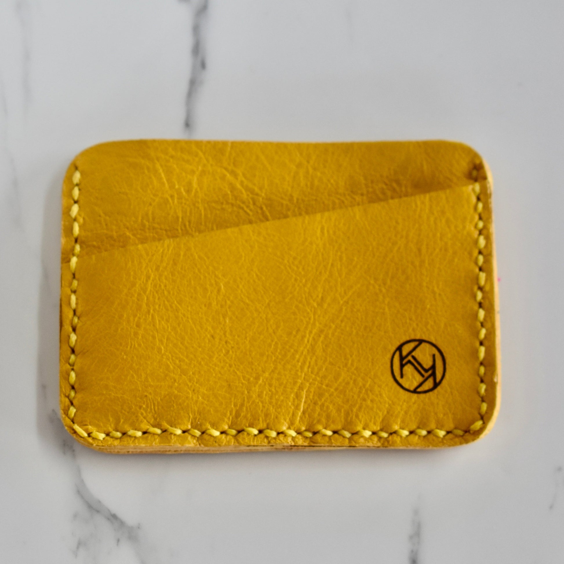 Beautifully hand made genuine leather card holder. Perfect gift idea for a man or women - it can store up to 6 cards.