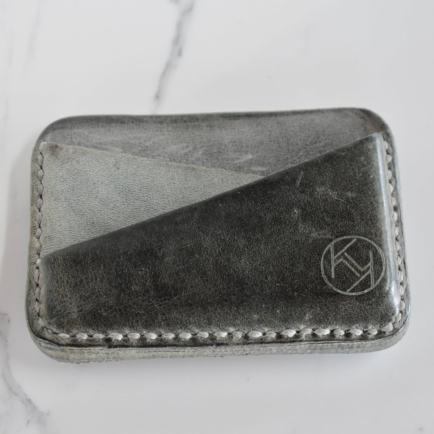 Beautifully hand made genuine leather card holder. Perfect gift idea for a man or women - it can store up to 10 cards.