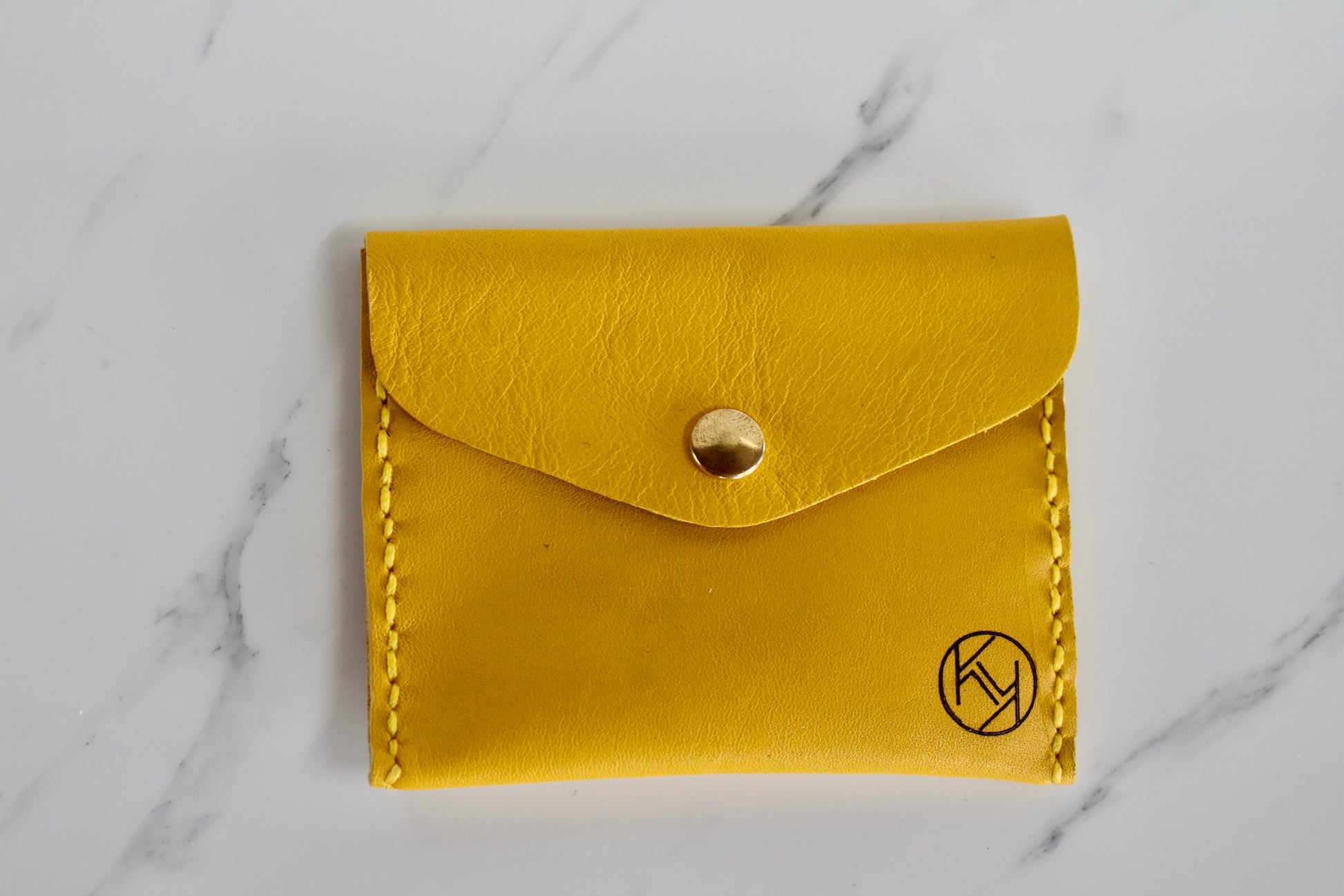 Beautifully handmade and hand stitched leather mini purse. Perfect for a quick trip to the shop. This also makes an amazing addition to a bridesmaids gift box. 