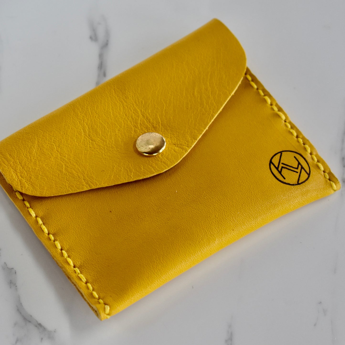 Beautifully handmade and hand stitched leather mini purse. Perfect for a quick trip to the shop. This also makes an amazing addition to a bridesmaids gift box. 