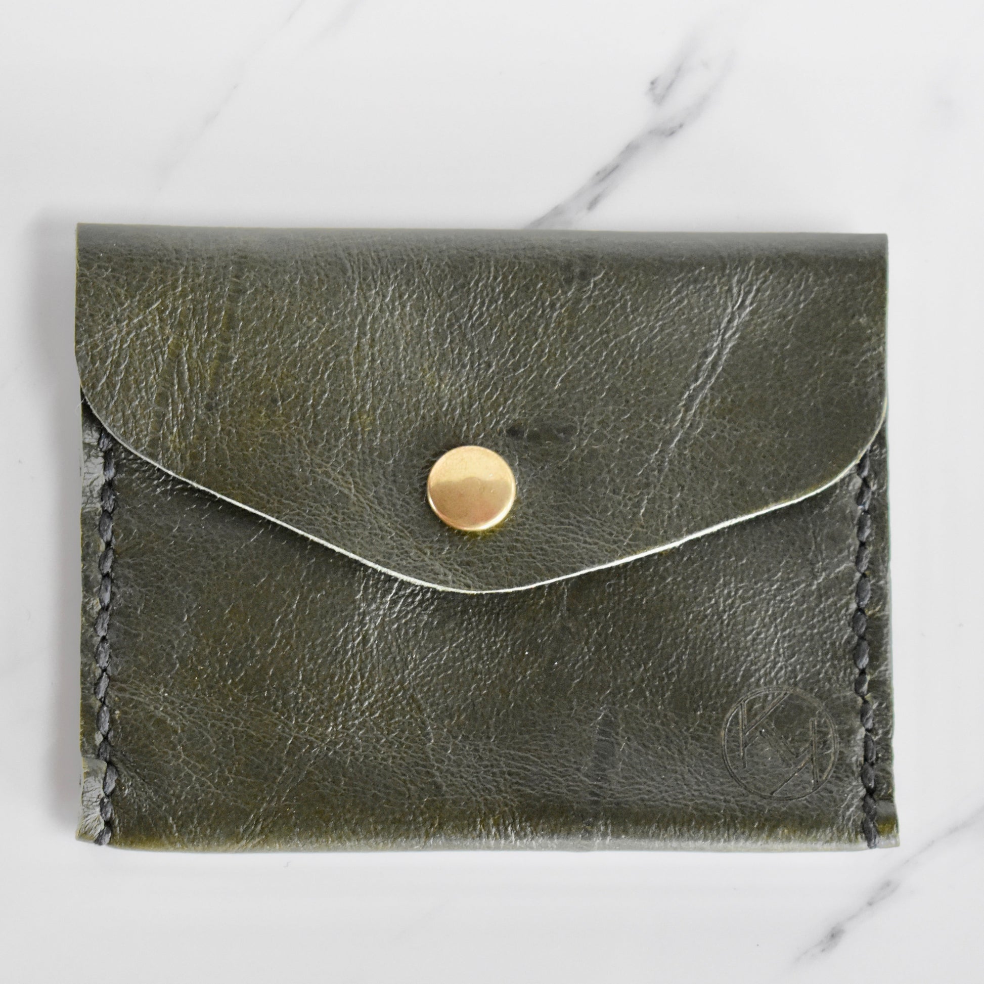 Beautifully handmade and hand stitched leather mini purse. Perfect for a quick trip to the shop. This also makes an amazing addition to a bridesmaids gift box. 