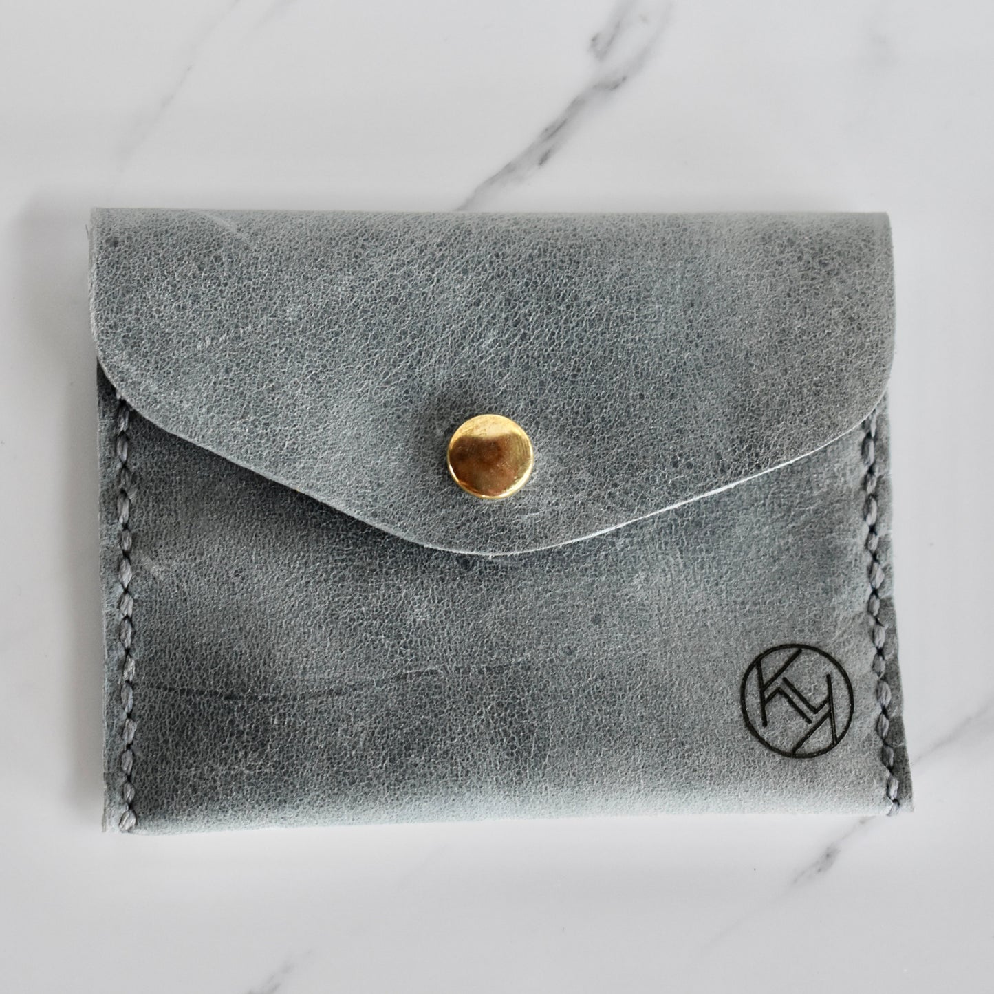 Beautifully handmade and hand stitched leather mini purse. Perfect for a quick trip to the shop. This also makes an amazing addition to a bridesmaids gift box. 