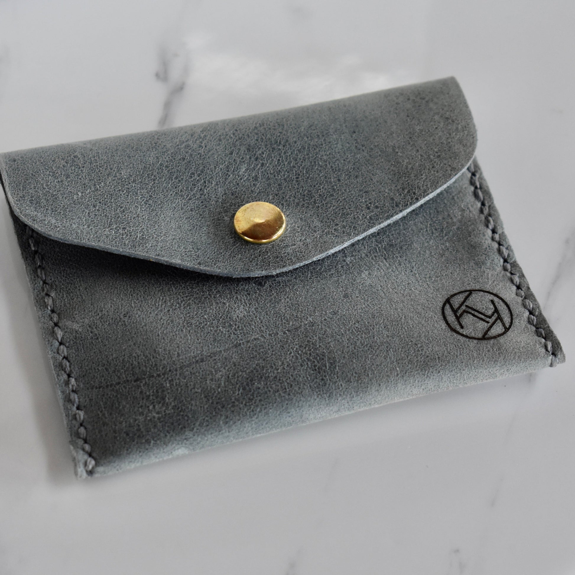 Beautifully handmade and hand stitched leather mini purse. Perfect for a quick trip to the shop. This also makes an amazing addition to a bridesmaids gift box. 