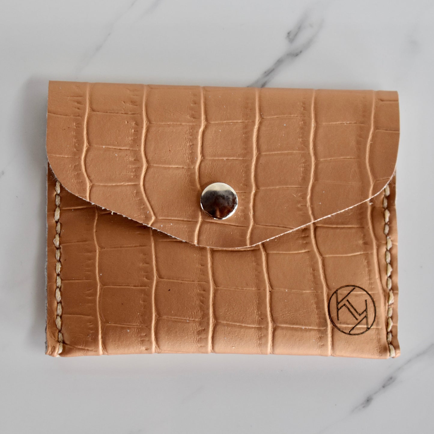 Beautifully handmade and hand stitched leather mini purse. Perfect for a quick trip to the shop. This also makes an amazing addition to a bridesmaids gift box. 