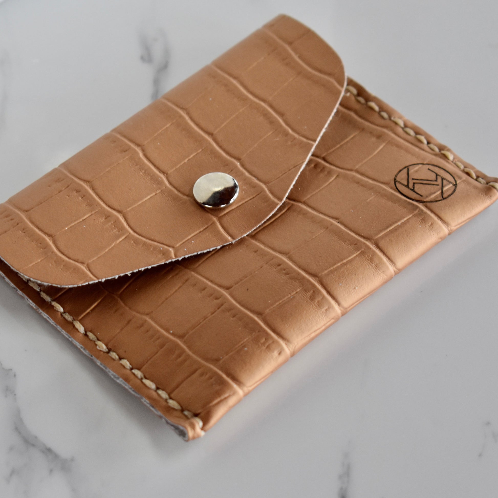 Beautifully handmade and hand stitched leather mini purse. Perfect for a quick trip to the shop. This also makes an amazing addition to a bridesmaids gift box. 