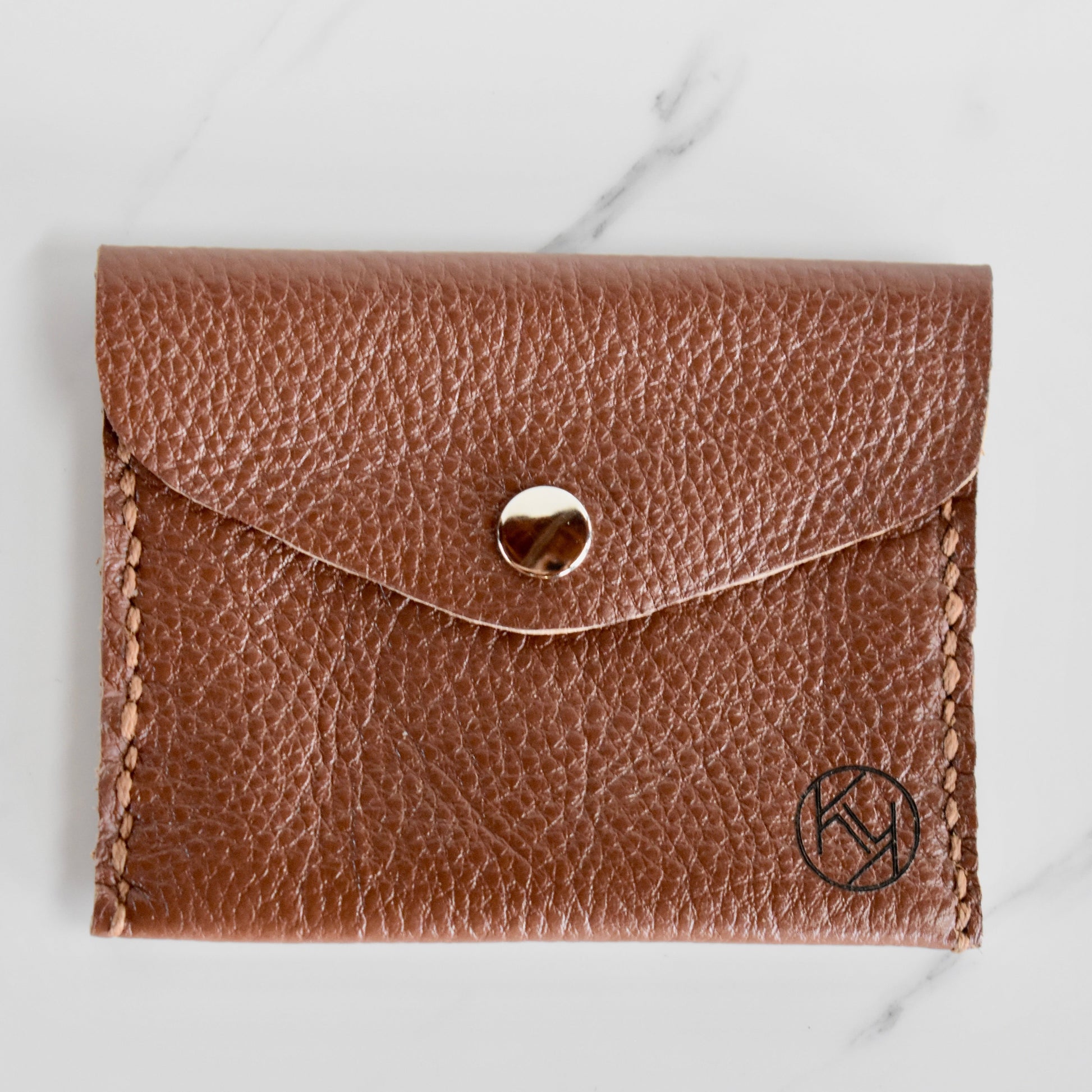 Beautifully handmade and hand stitched leather mini purse. Perfect for a quick trip to the shop. This also makes an amazing addition to a bridesmaids gift box. 