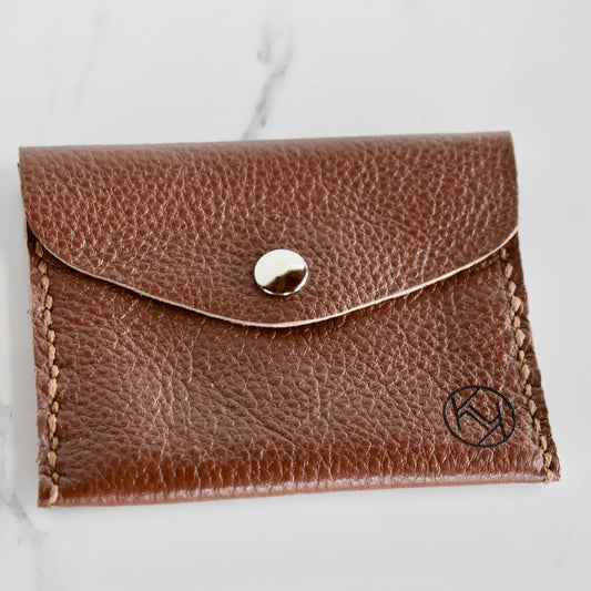 Beautifully handmade and hand stitched leather mini purse. Perfect for a quick trip to the shop. This also makes an amazing addition to a bridesmaids gift box. 