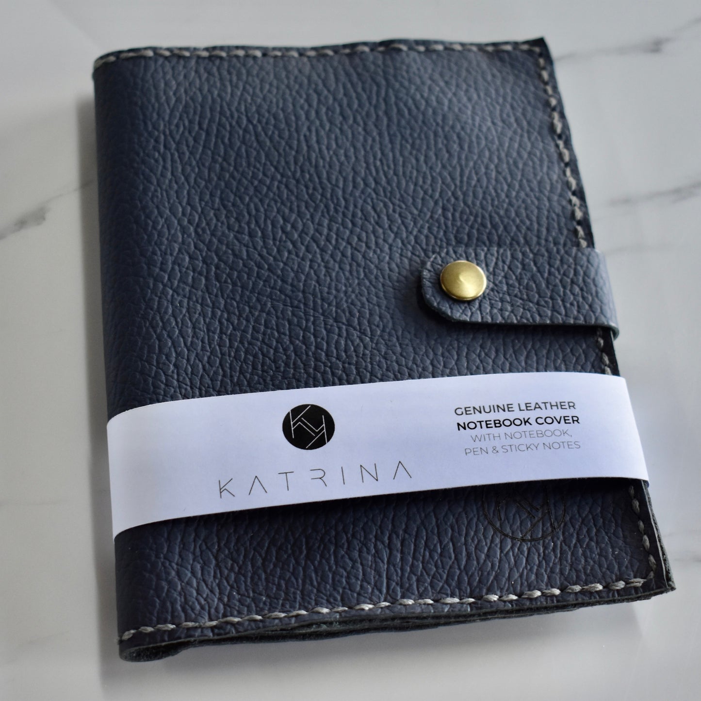 Beautifully handmade and hand stitched leather notebook. Perfect for a gift idea. This also makes an amazing addition to a bridesmaids gift box. This item includes a pen, small notebook as well as some aesthetic sticky notes! The best part is it will fit your phone as well. 