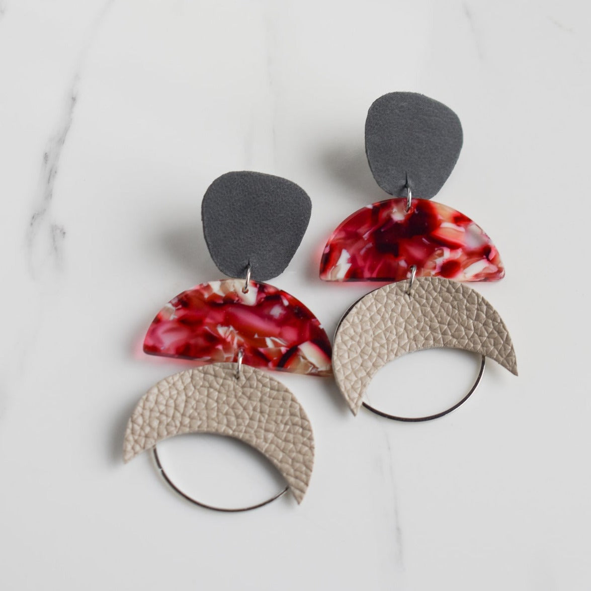 Handmade, light weight and comfortable to wear all day long leather earrings. All our earring hooks are made with a high quality stainless steel and they are hypo allergenic.  They will not tarnish or irritate your sensitive skin.