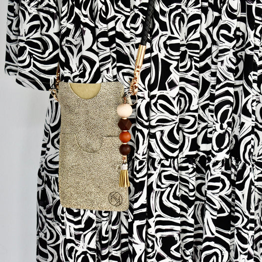 Beautifully handmade and hand stitched leather cellphone sling. Perfect for everyday use. It has a slot for cards and cash. Turn your sling towards your body for extra safety. This also makes an amazing gift and addition to a bridesmaids gift box. YOUR NEW BEST FRIEND - keep your belongings HANDS ON! 