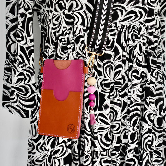 Beautifully handmade and hand stitched leather cellphone sling. Perfect for everyday use. It has a slot for cards and cash. Turn your sling towards your body for extra safety. This also makes an amazing gift and addition to a bridesmaids gift box. YOUR NEW BEST FRIEND - keep your belongings HANDS ON!
