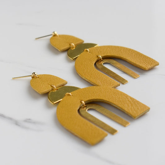 Handmade, light weight and comfortable to wear all day long leather earrings. All our earring hooks are made with a high quality stainless steel and they are hypo allergenic.  They will not tarnish or irritate your sensitive skin.