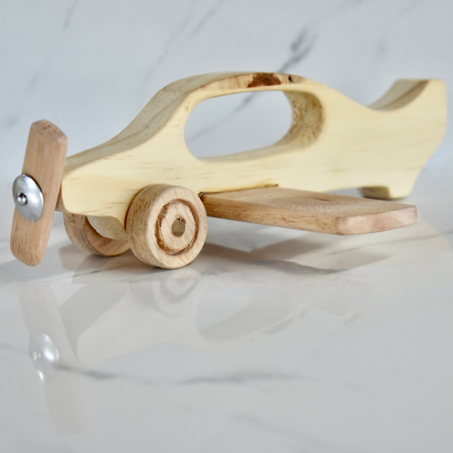 This hand held handmade wooden plane is the perfect present for any kid (or kid at heart)! It can be left as is or painted for an extra touch of fun. Makes for an amazing baby shower gift.