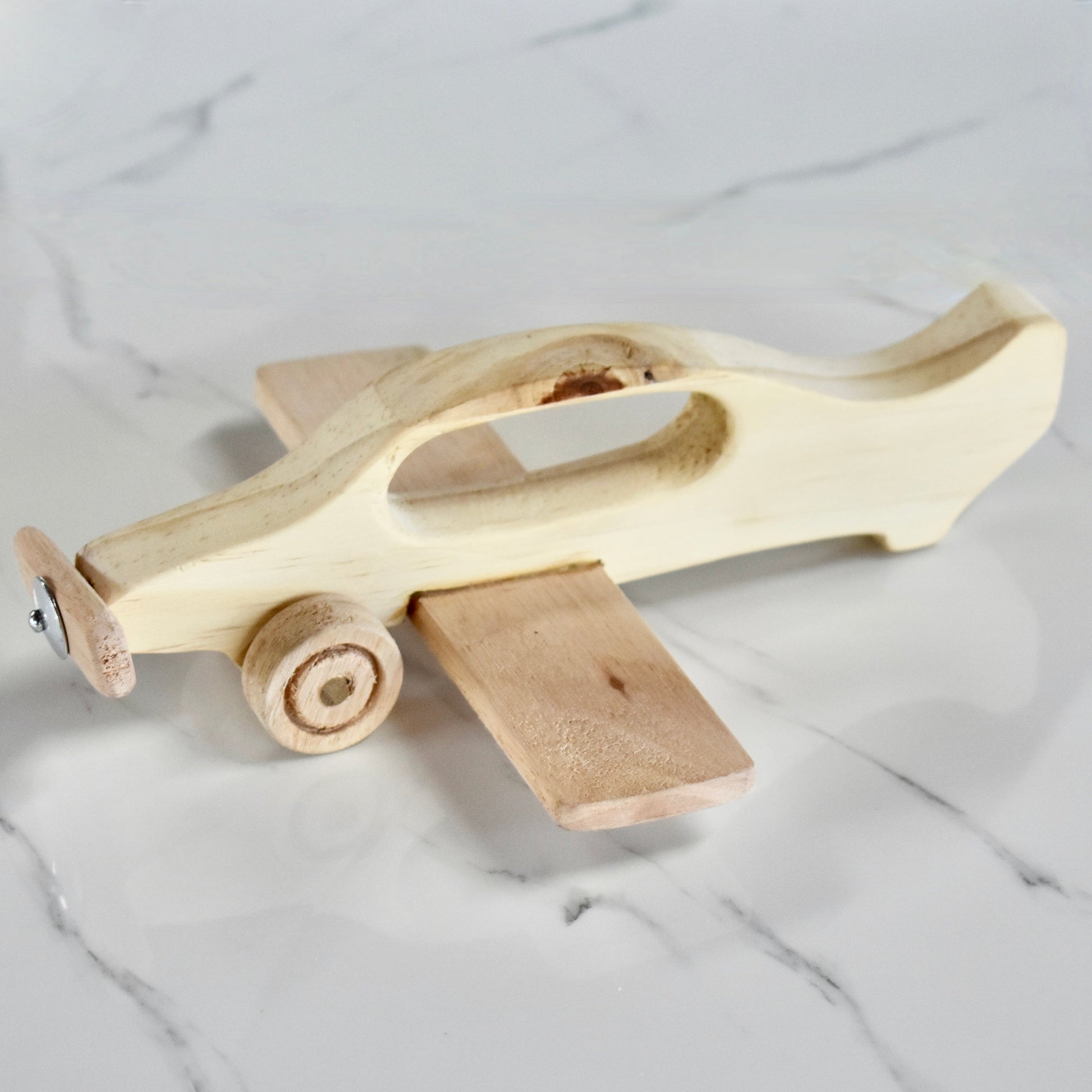 This hand held handmade wooden plane is the perfect present for any kid (or kid at heart)! It can be left as is or painted for an extra touch of fun. Makes for an amazing baby shower gift.