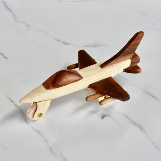 This small handmade wooden plane is the perfect present for any kid (or kid at heart)! It can be left as is or painted for an extra touch of fun. Makes for an amazing baby shower gift. Made with Kiaat solid wood and pine. 