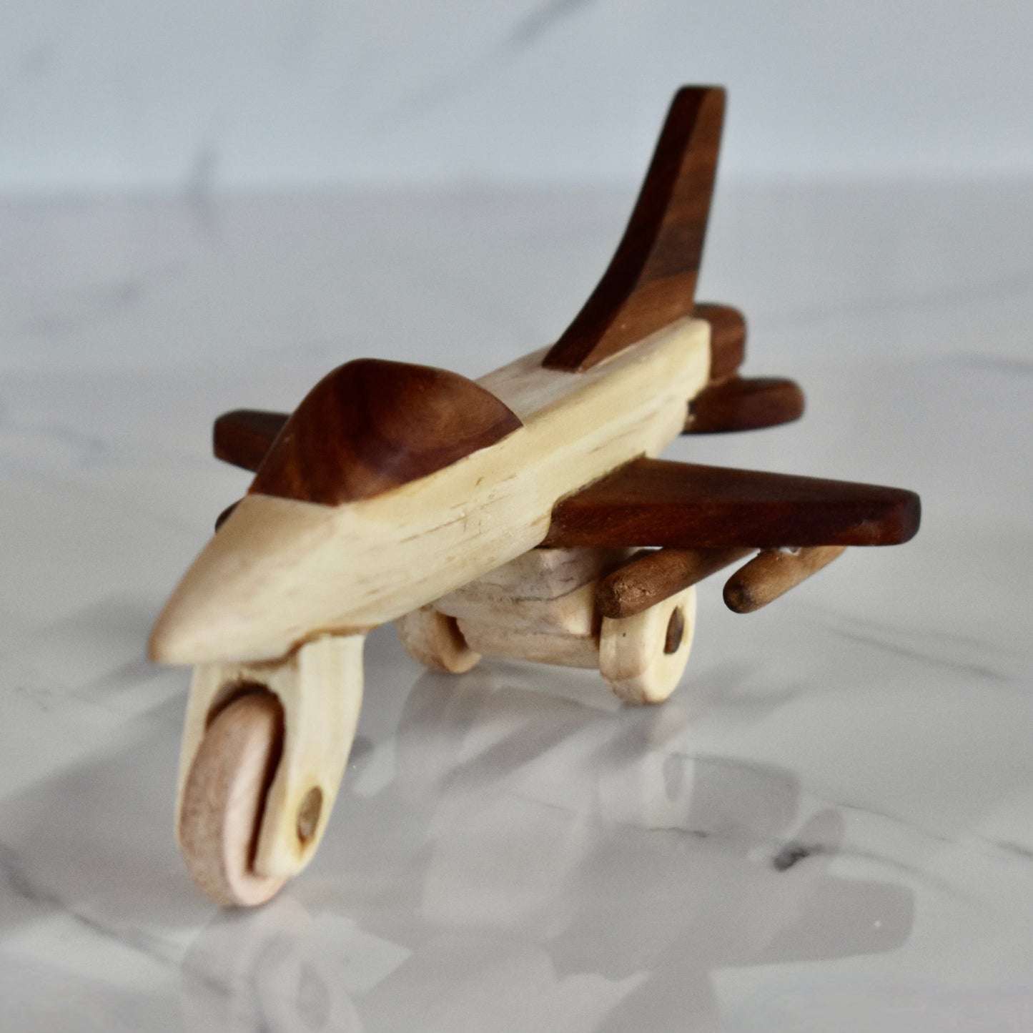 This small handmade wooden plane is the perfect present for any kid (or kid at heart)! It can be left as is or painted for an extra touch of fun. Makes for an amazing baby shower gift. Made with Kiaat solid wood and pine. 