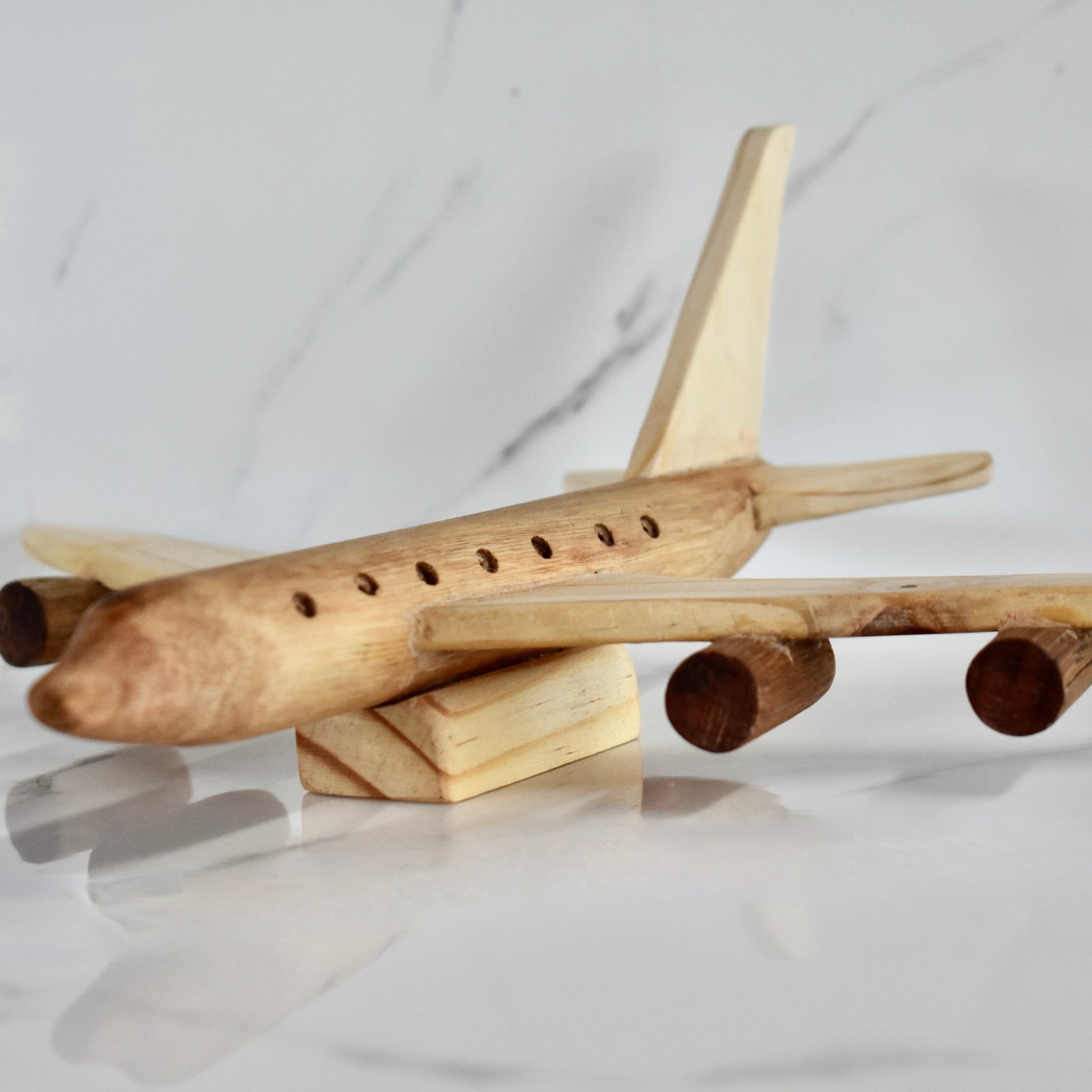 This small handmade wooden plane is the perfect present for any kid (or kid at heart)! It can be left as is or painted for an extra touch of fun. Makes for an amazing baby shower gift. 