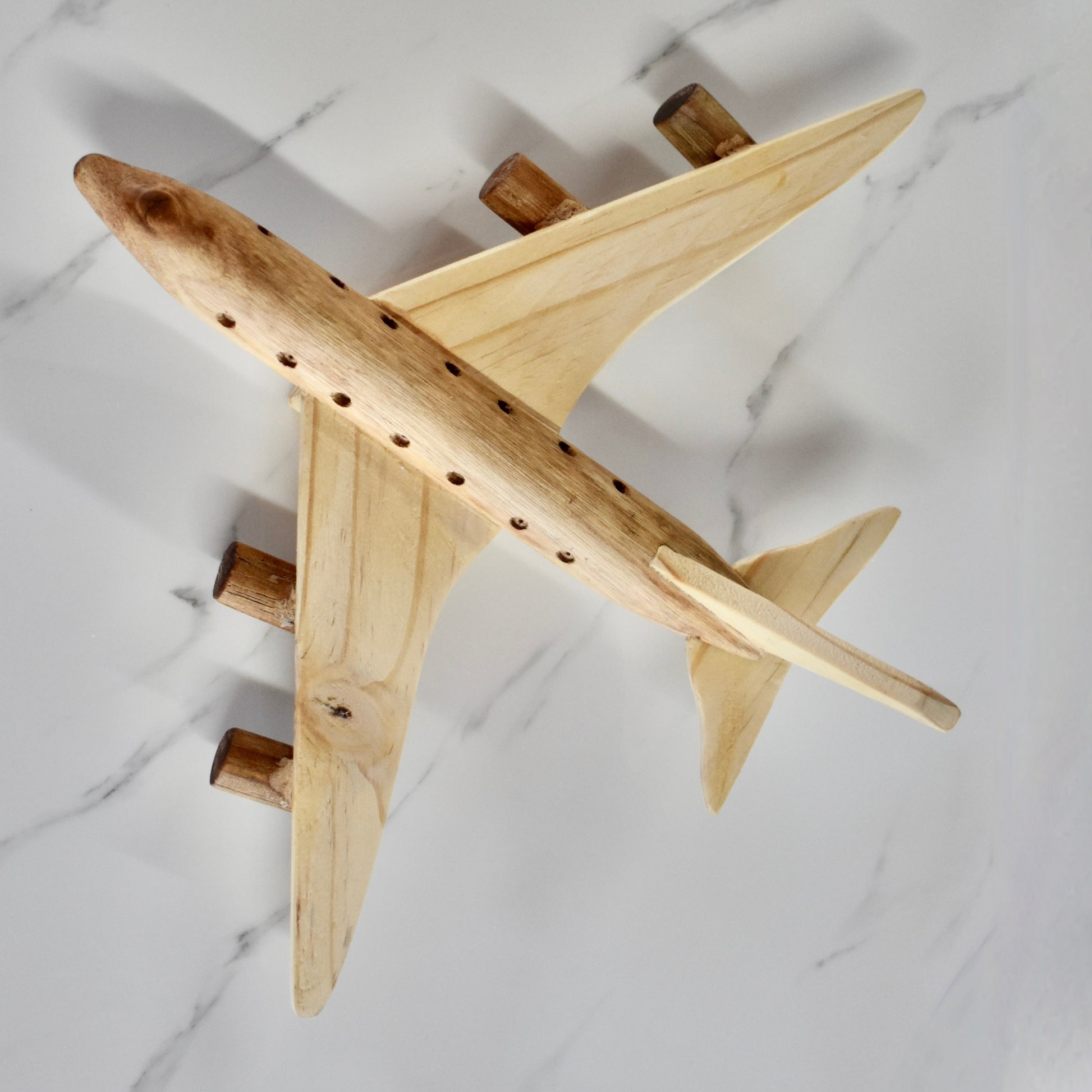 This small handmade wooden plane is the perfect present for any kid (or kid at heart)! It can be left as is or painted for an extra touch of fun. Makes for an amazing baby shower gift. 