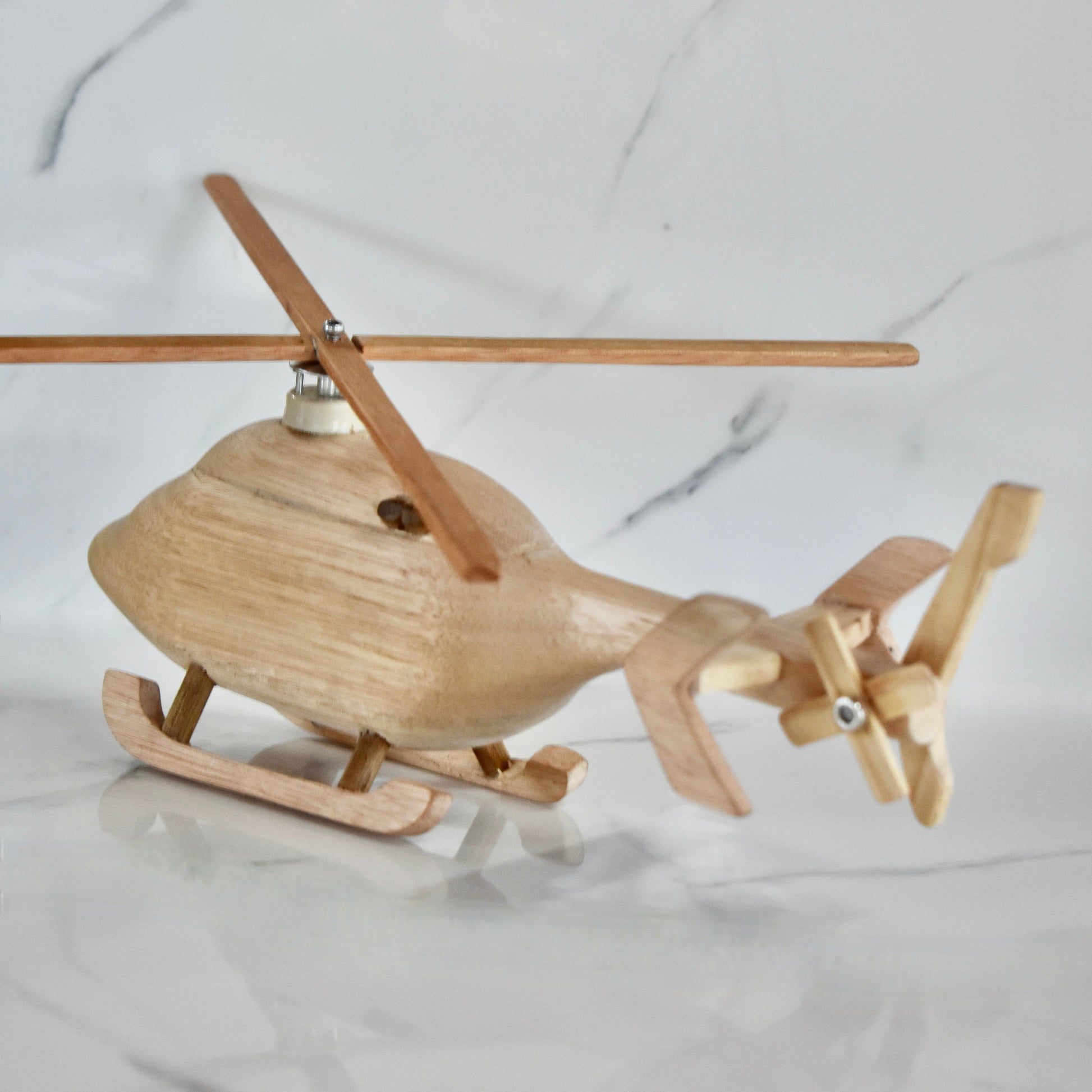 This small handmade wooden helicopter is the perfect present for any kid (or kid at heart)! It can be left as is or painted for an extra touch of fun. Makes for an amazing baby shower gift. 