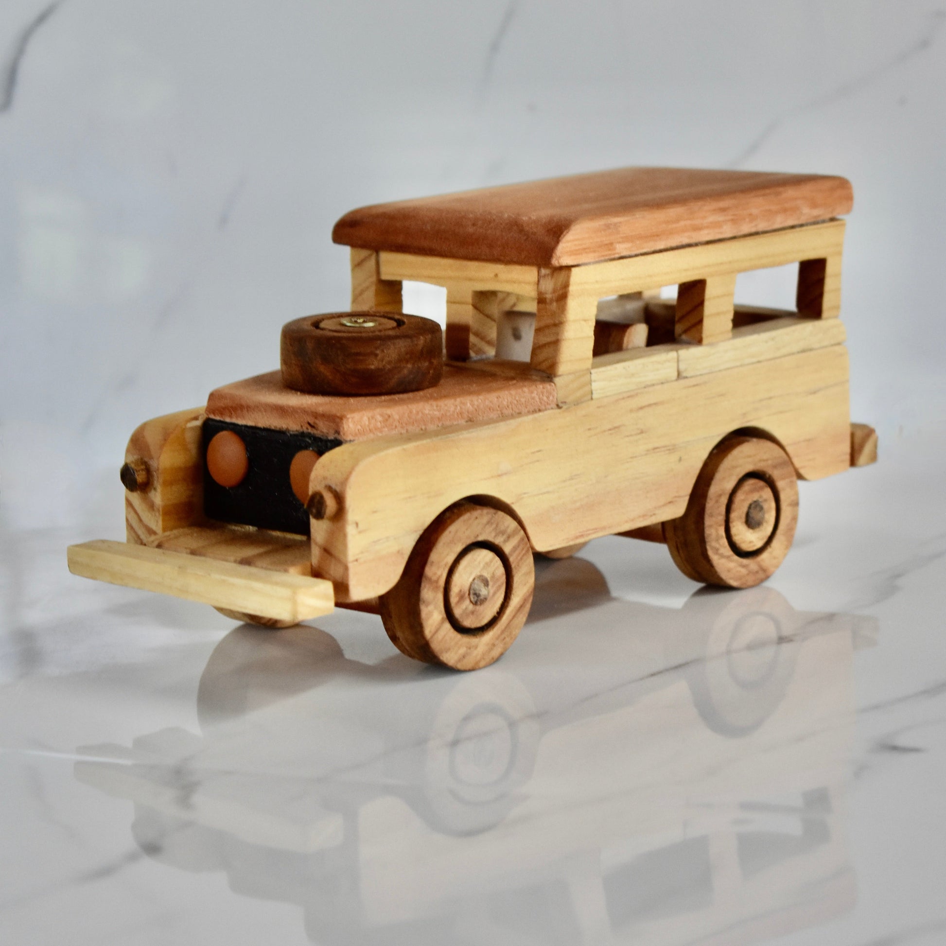 This small handmade wooden Land Rover is the perfect present for any kid (or kid at heart)! It can be left as is or painted for an extra touch of fun. Makes for an amazing baby shower gift. 