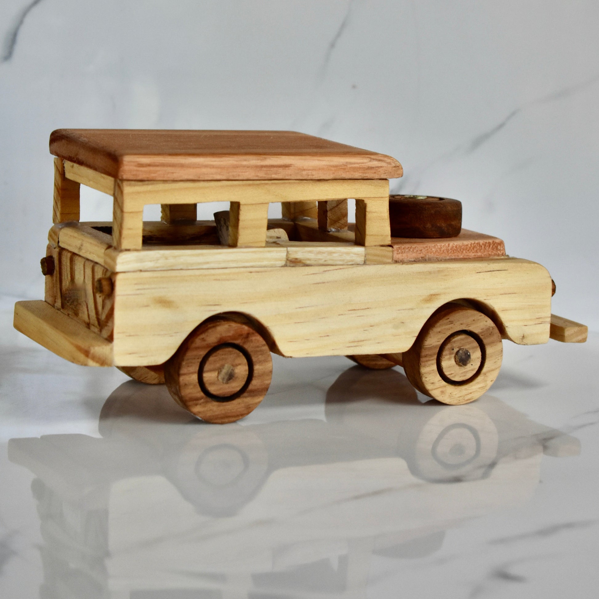 This small handmade wooden Land Rover is the perfect present for any kid (or kid at heart)! It can be left as is or painted for an extra touch of fun. Makes for an amazing baby shower gift. 