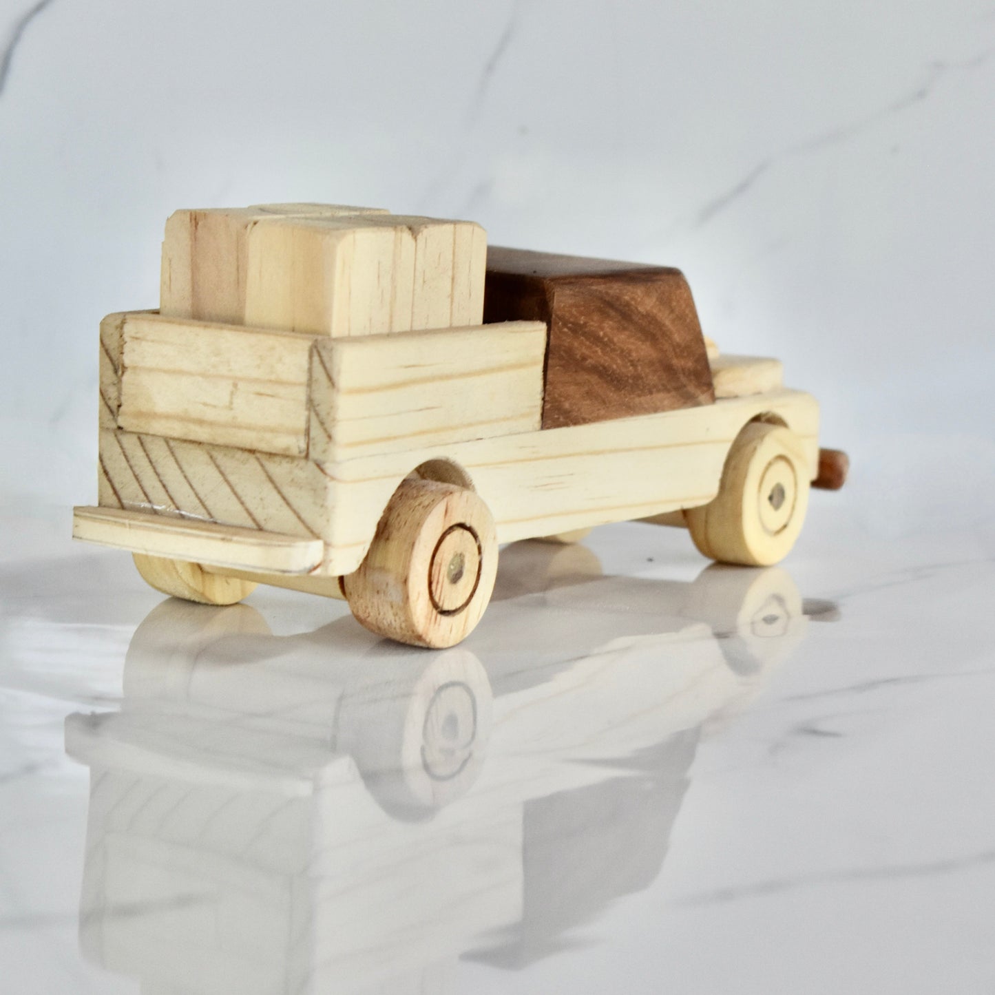 This small handmade wooden land cruiser is the perfect present for any kid (or kid at heart)! You also get some free lusern bales to unload and load on your cruiser. It can be left as is or painted for an extra touch of fun. Makes for an amazing baby shower gift. 