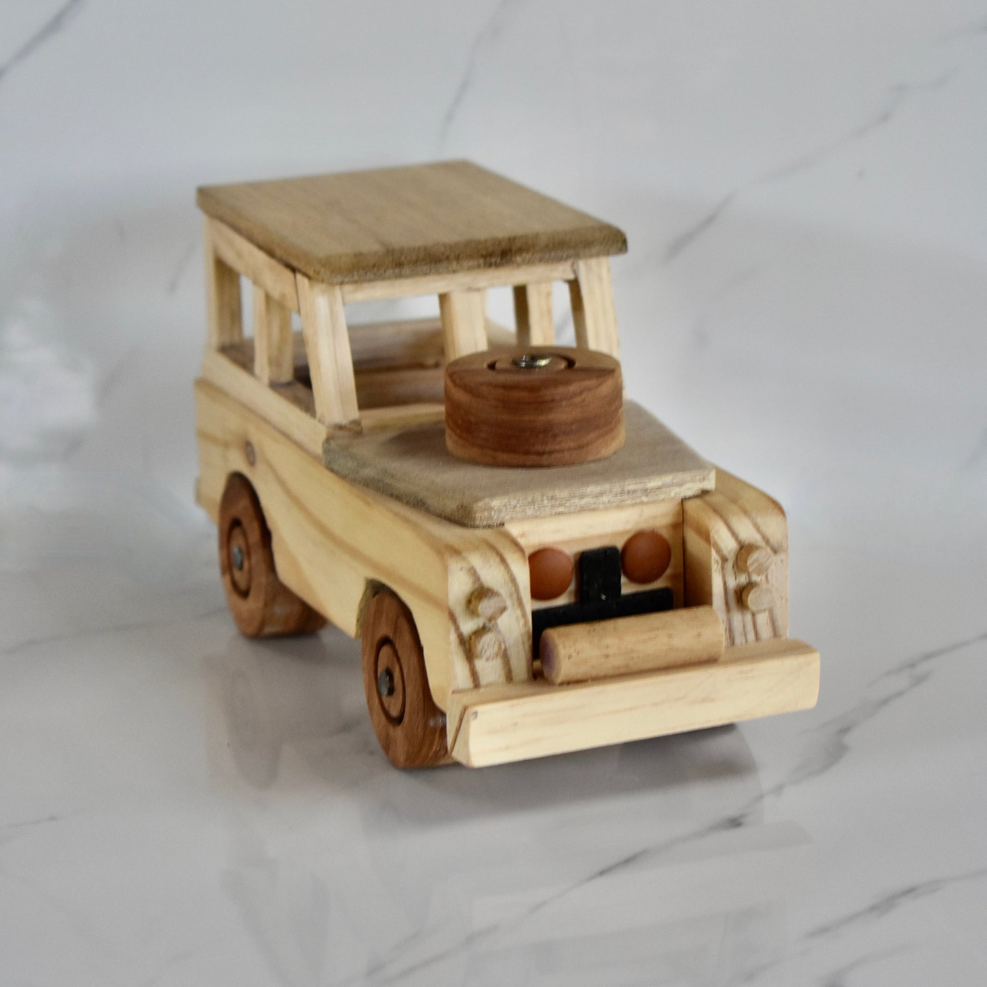 This small handmade wooden Land Rover is the perfect present for any kid (or kid at heart)! It can be left as is or painted for an extra touch of fun. Makes for an amazing baby shower gift. 