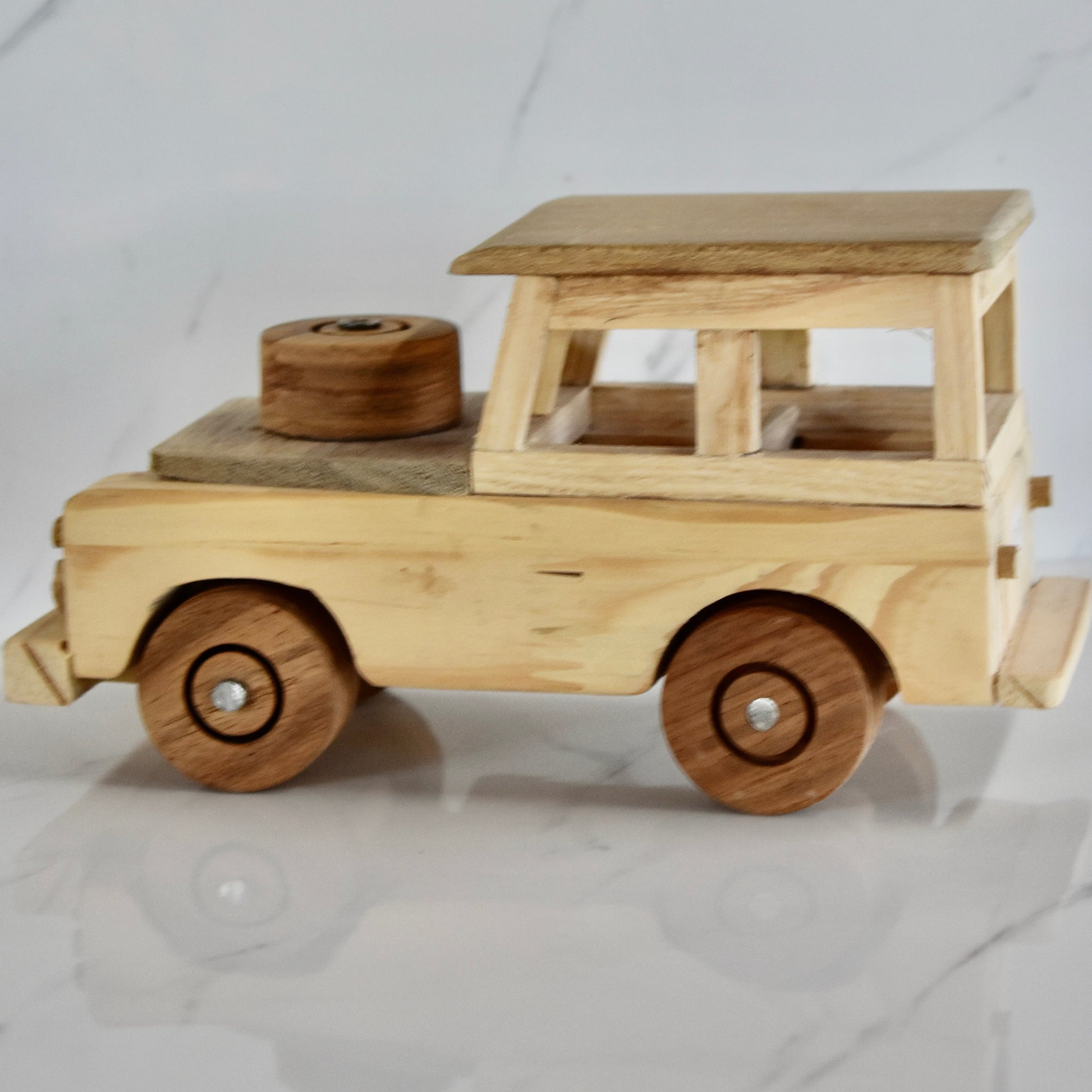 This small handmade wooden Land Rover is the perfect present for any kid (or kid at heart)! It can be left as is or painted for an extra touch of fun. Makes for an amazing baby shower gift. 