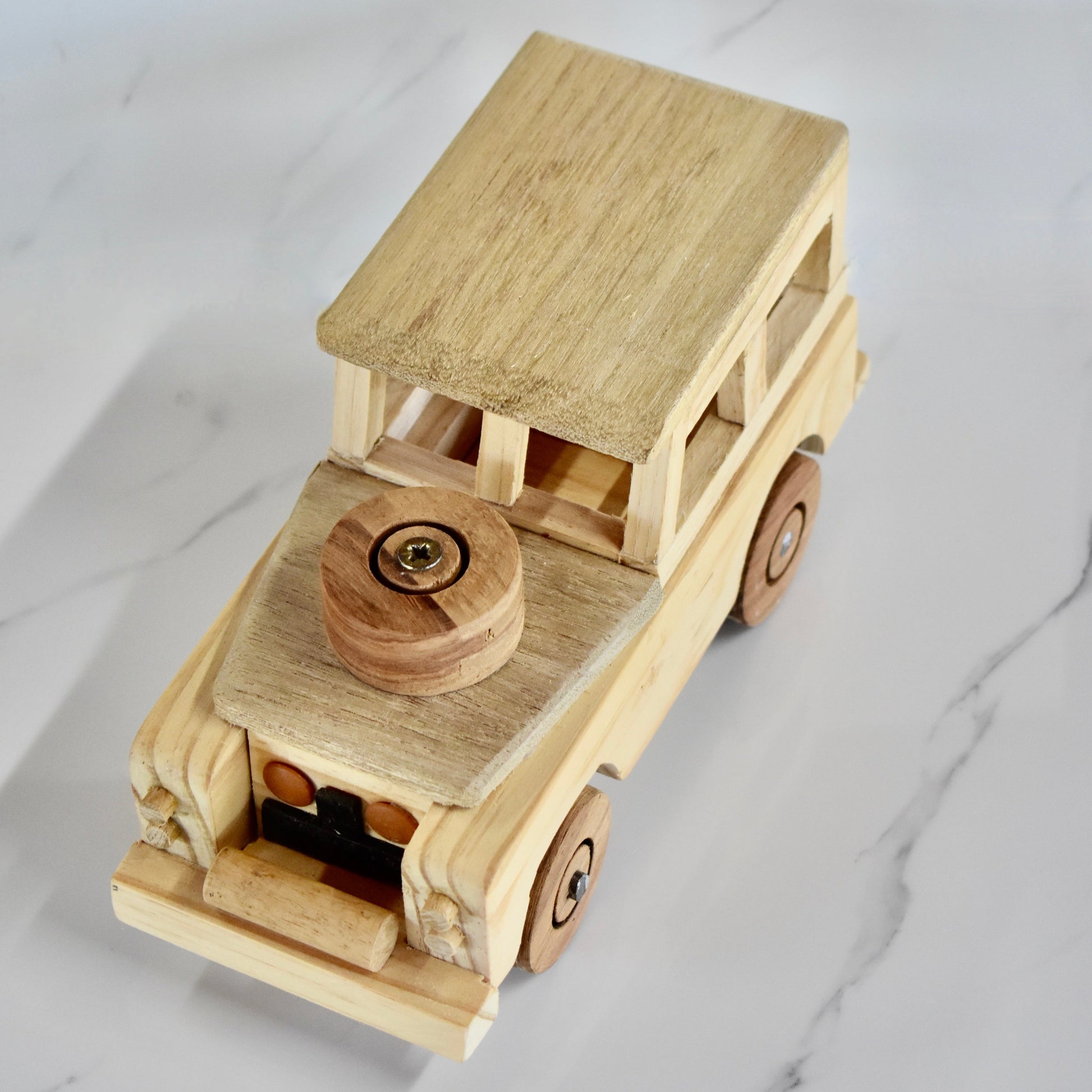 This small handmade wooden Land Rover is the perfect present for any kid (or kid at heart)! It can be left as is or painted for an extra touch of fun. Makes for an amazing baby shower gift. 