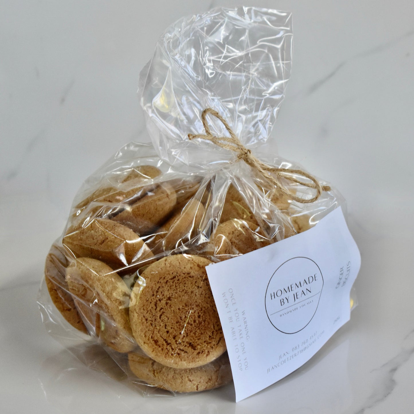 Indulge in decadent, just-out-of-the-oven homemade cookies. Delight in their melt-in-your-mouth texture and irresistible crispy goodness. Ideal for any occasion or as a luxurious gift. Personalised wedding favor choices are also on offer. For larger quantities, take advantage of our bulk discount and beautifully package them for your guests.