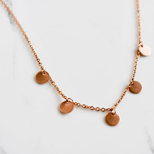 Beautifully handcrafted 5 disc rose gold stainless steel necklace. Waterproof and hypoallergenic. 