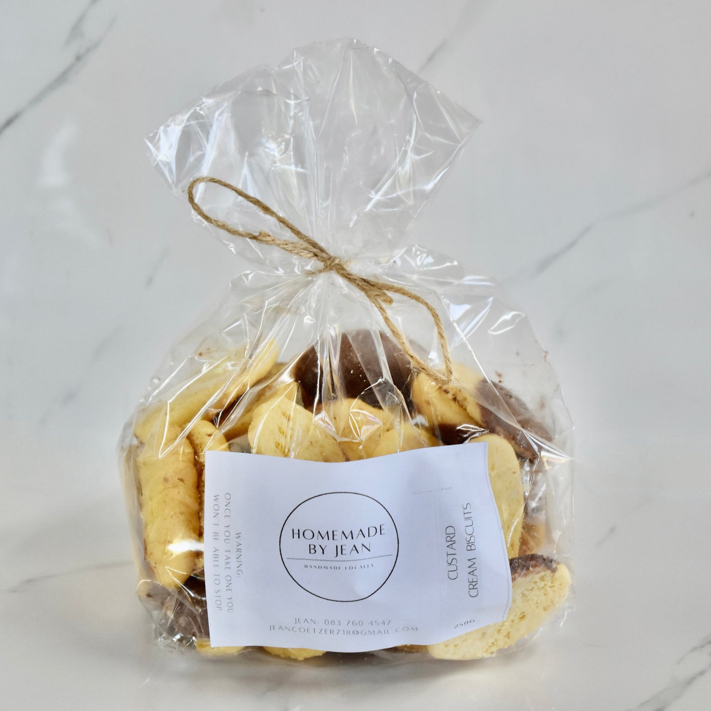 Indulge in decadent, just-out-of-the-oven homemade cookies. Delight in their melt-in-your-mouth texture and irresistible crispy goodness. Ideal for any occasion or as a luxurious gift. Personalised wedding favor choices are also on offer. For larger quantities, take advantage of our bulk discount and beautifully package them for your guests.