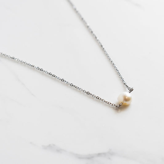 Beautifully handcrafted stainless steel necklace with a fresh water pearl. Waterproof, hypoallergenic jewellery.