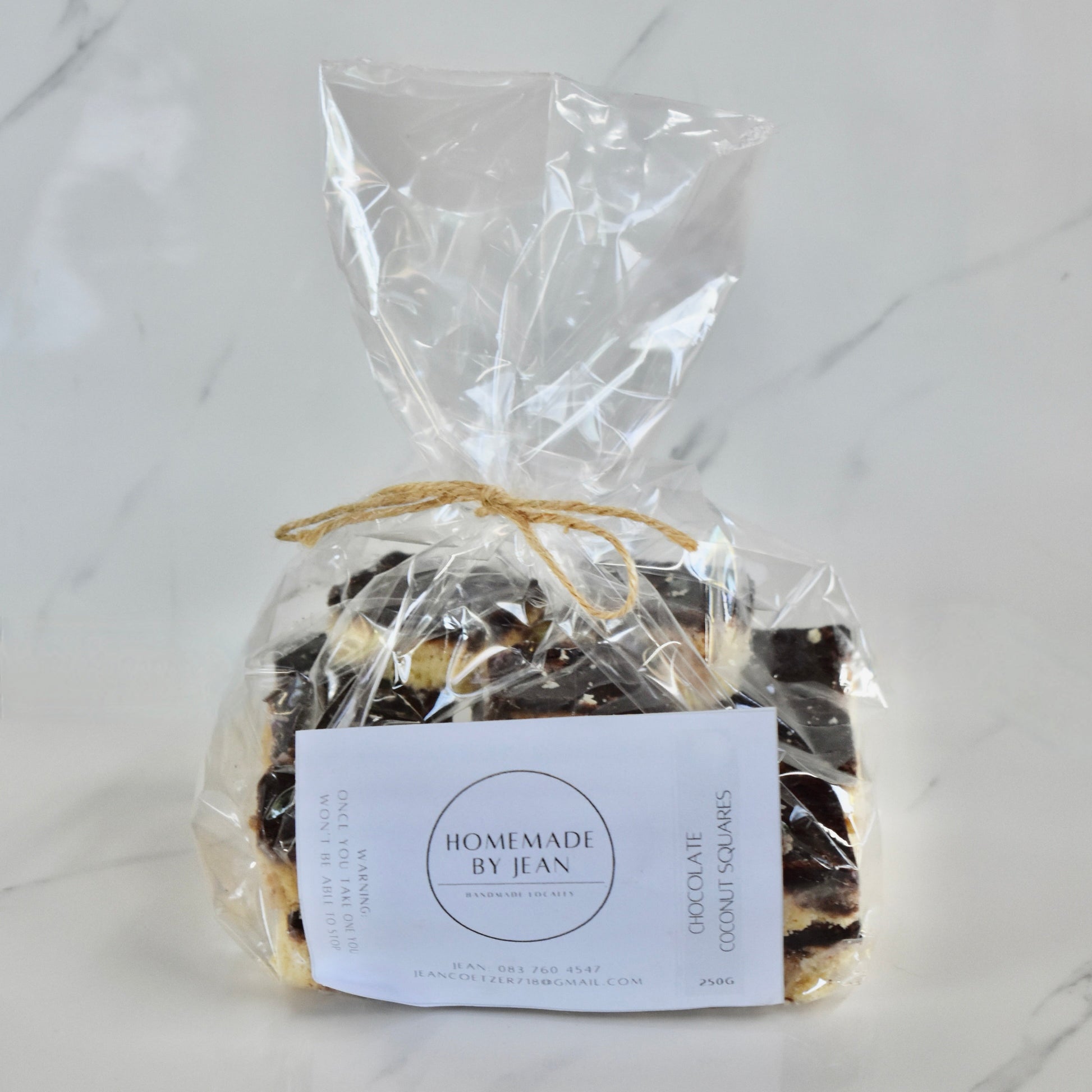 Indulge in decadent, just-out-of-the-oven homemade cookies. Delight in their melt-in-your-mouth texture and irresistible crispy goodness. Ideal for any occasion or as a luxurious gift. Personalised wedding favor choices are also on offer. For larger quantities, take advantage of our bulk discount and beautifully package them for your guests.