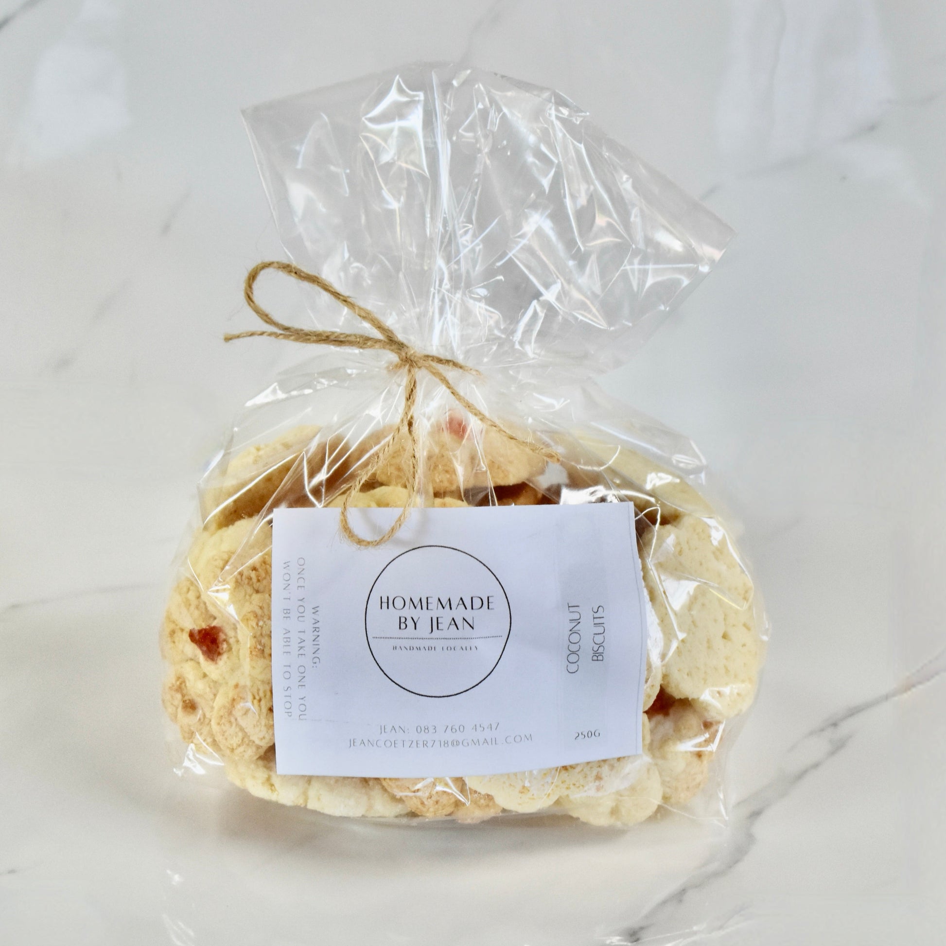 Indulge in decadent, just-out-of-the-oven homemade cookies. Delight in their melt-in-your-mouth texture and irresistible crispy goodness. Ideal for any occasion or as a luxurious gift. Personalised wedding favor choices are also on offer. For larger quantities, take advantage of our bulk discount and beautifully package them for your guests.