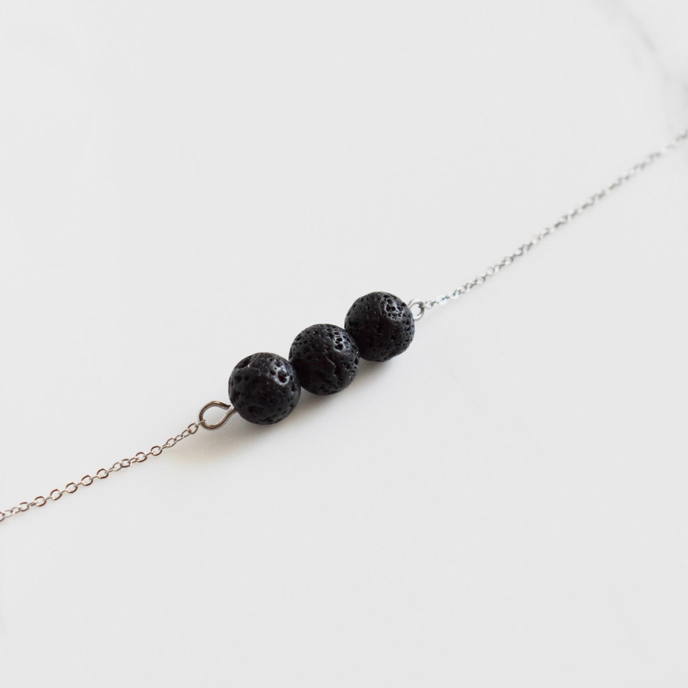 Beautifully handcrafted stainless steel bracelet with a lava bead. Add a drop of your favourite essential oil or perfume on your lava bead for a personal diffuser. 