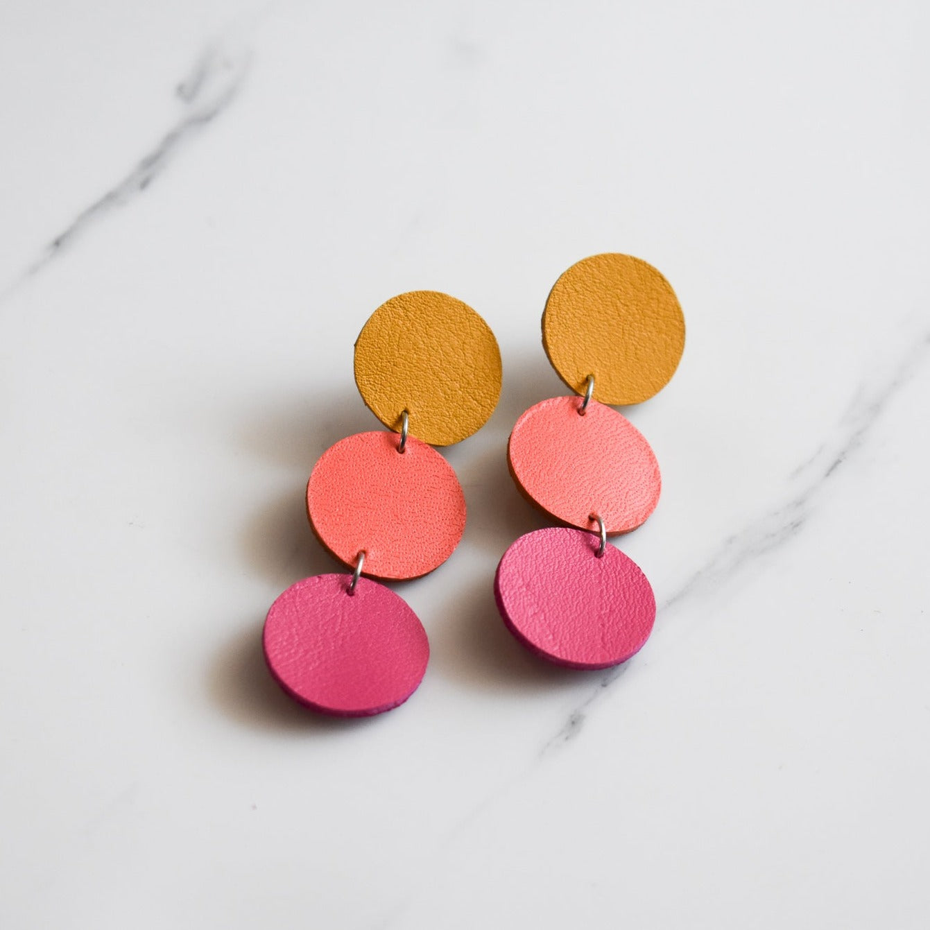 Handmade, light weight and comfortable to wear all day long leather earrings. All our earring hooks are made with a high quality stainless steel and they are hypo allergenic.  They will not tarnish or irritate your sensitive skin.