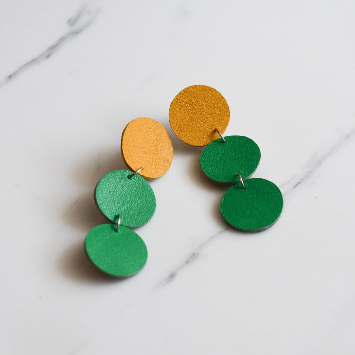 Handmade, light weight and comfortable to wear all day long leather earrings. All our earring hooks are made with a high quality stainless steel and they are hypo allergenic.  They will not tarnish or irritate your sensitive skin.