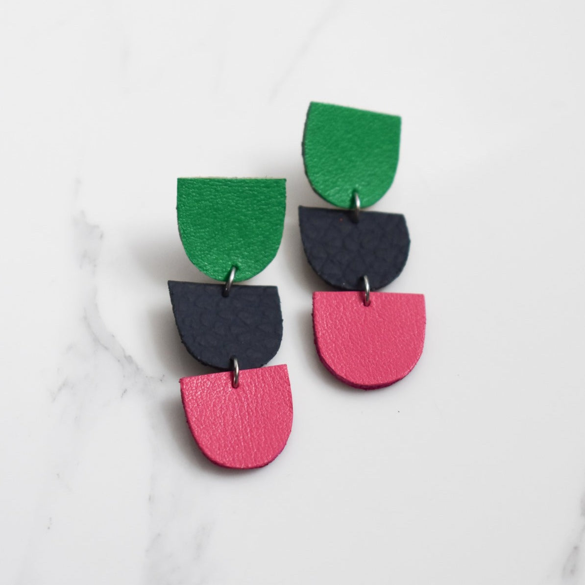 Handmade, light weight and comfortable to wear all day long leather earrings. All our earring hooks are made with a high quality stainless steel and they are hypo allergenic.  They will not tarnish or irritate your sensitive skin.