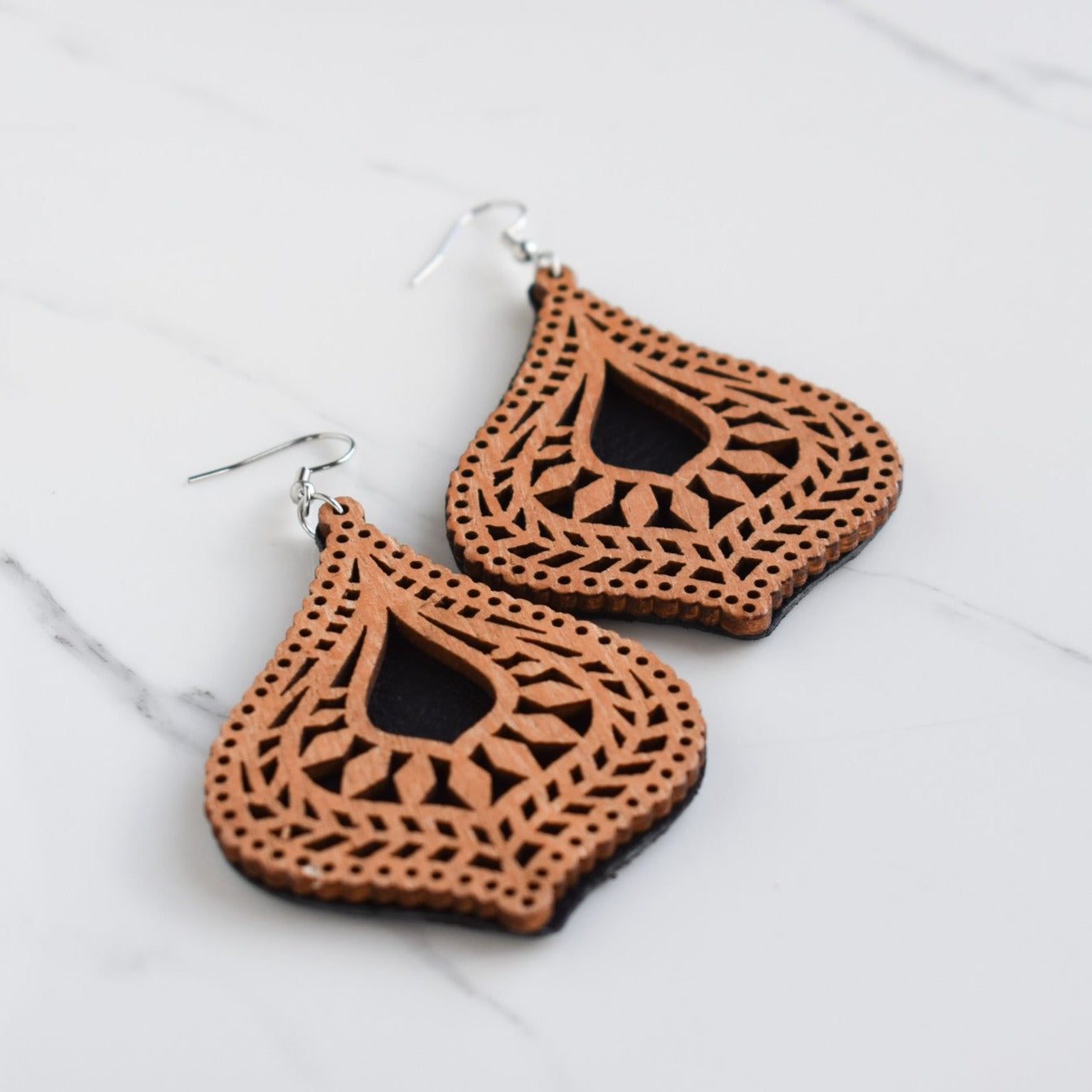 Handmade, light weight and comfortable to wear all day long leather earrings. All our earring hooks are made with a high quality stainless steel and they are hypo allergenic.  They will not tarnish or irritate your sensitive skin.