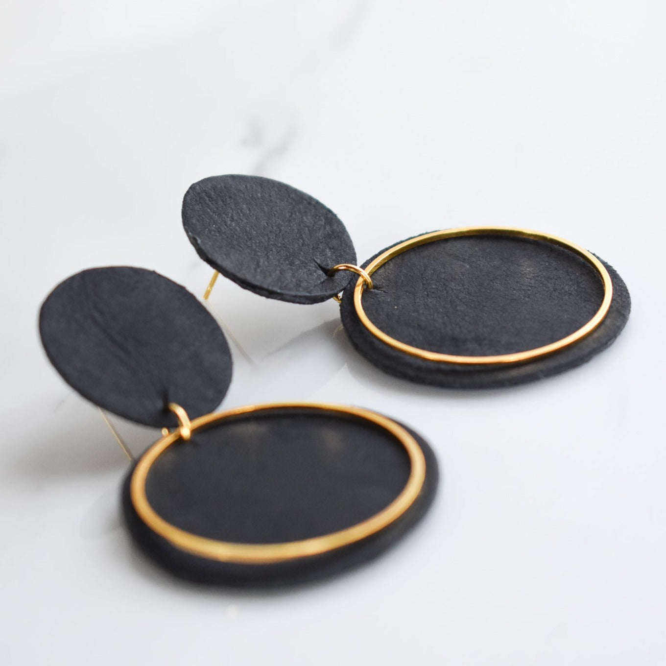 Handmade, light weight and comfortable to wear all day long leather earrings. All our earring hooks are made with a high quality stainless steel and they are hypo allergenic.  They will not tarnish or irritate your sensitive skin.