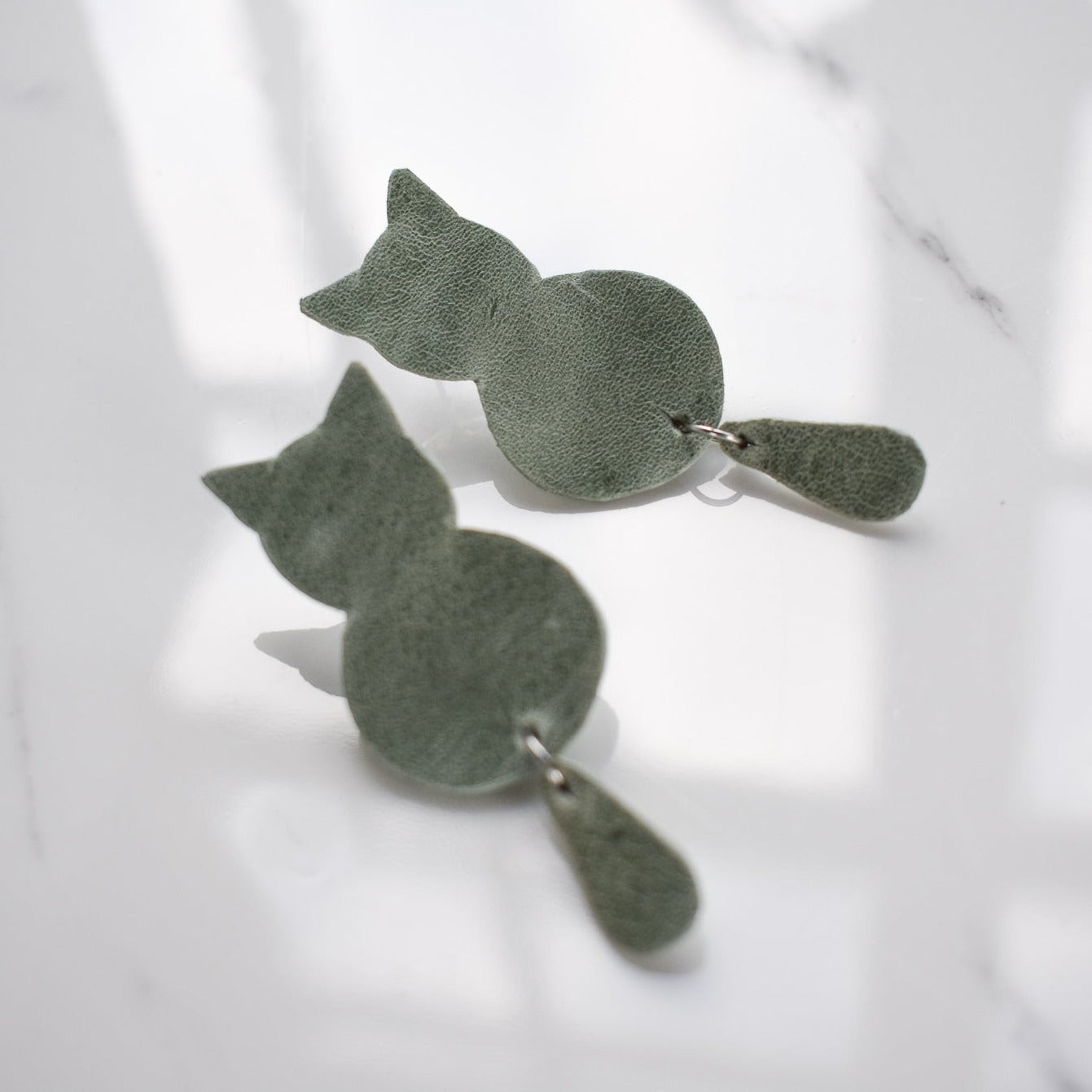 Handmade, light weight and comfortable to wear all day long leather earrings. All our earring hooks are made with a high quality stainless steel and they are hypo allergenic.  They will not tarnish or irritate your sensitive skin.