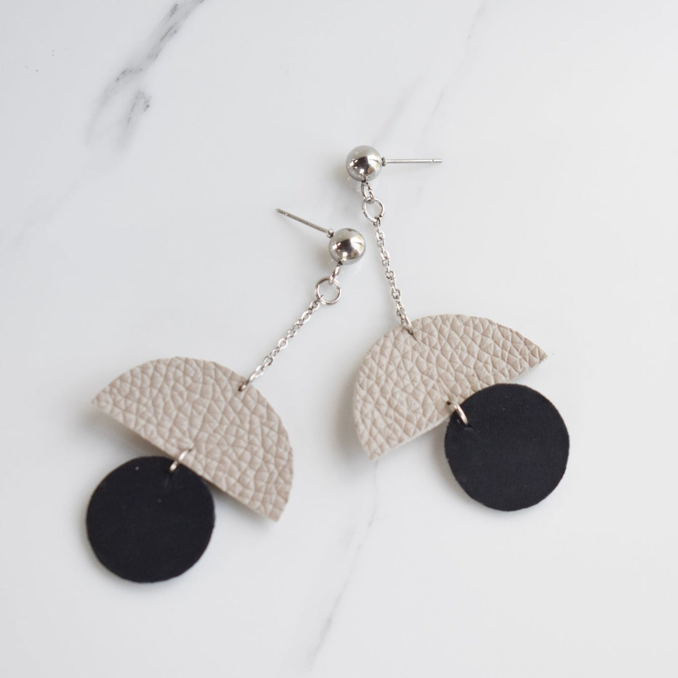 Handmade, light weight and comfortable to wear all day long leather earrings. All our earring hooks are made with a high quality stainless steel and they are hypo allergenic.  They will not tarnish or irritate your sensitive skin.