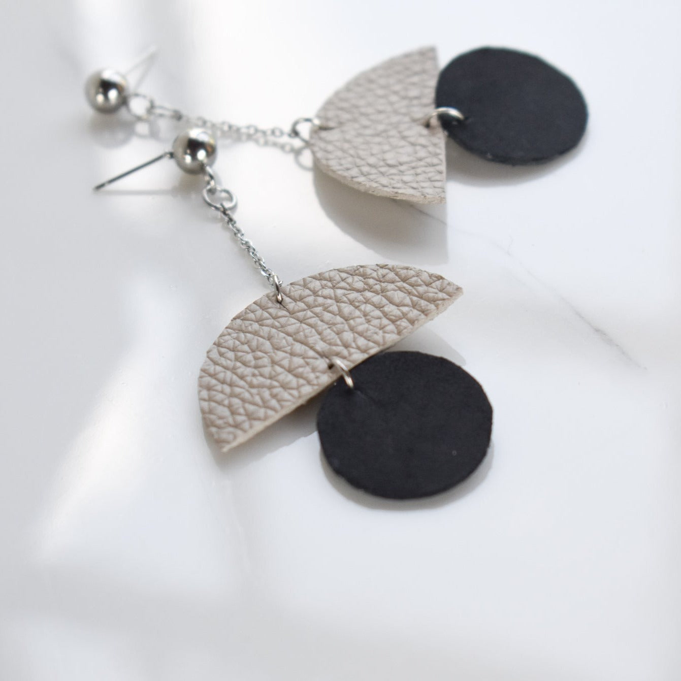 Handmade, light weight and comfortable to wear all day long leather earrings. All our earring hooks are made with a high quality stainless steel and they are hypo allergenic.  They will not tarnish or irritate your sensitive skin.