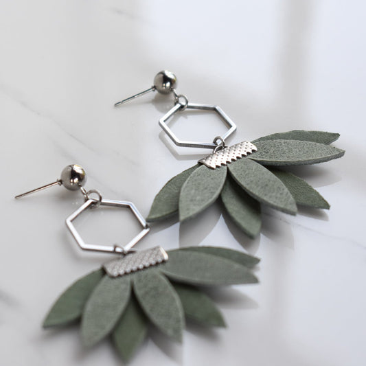 Handmade, light weight and comfortable to wear all day long leather earrings. All our earring hooks are made with a high quality stainless steel and they are hypo allergenic.  They will not tarnish or irritate your sensitive skin.