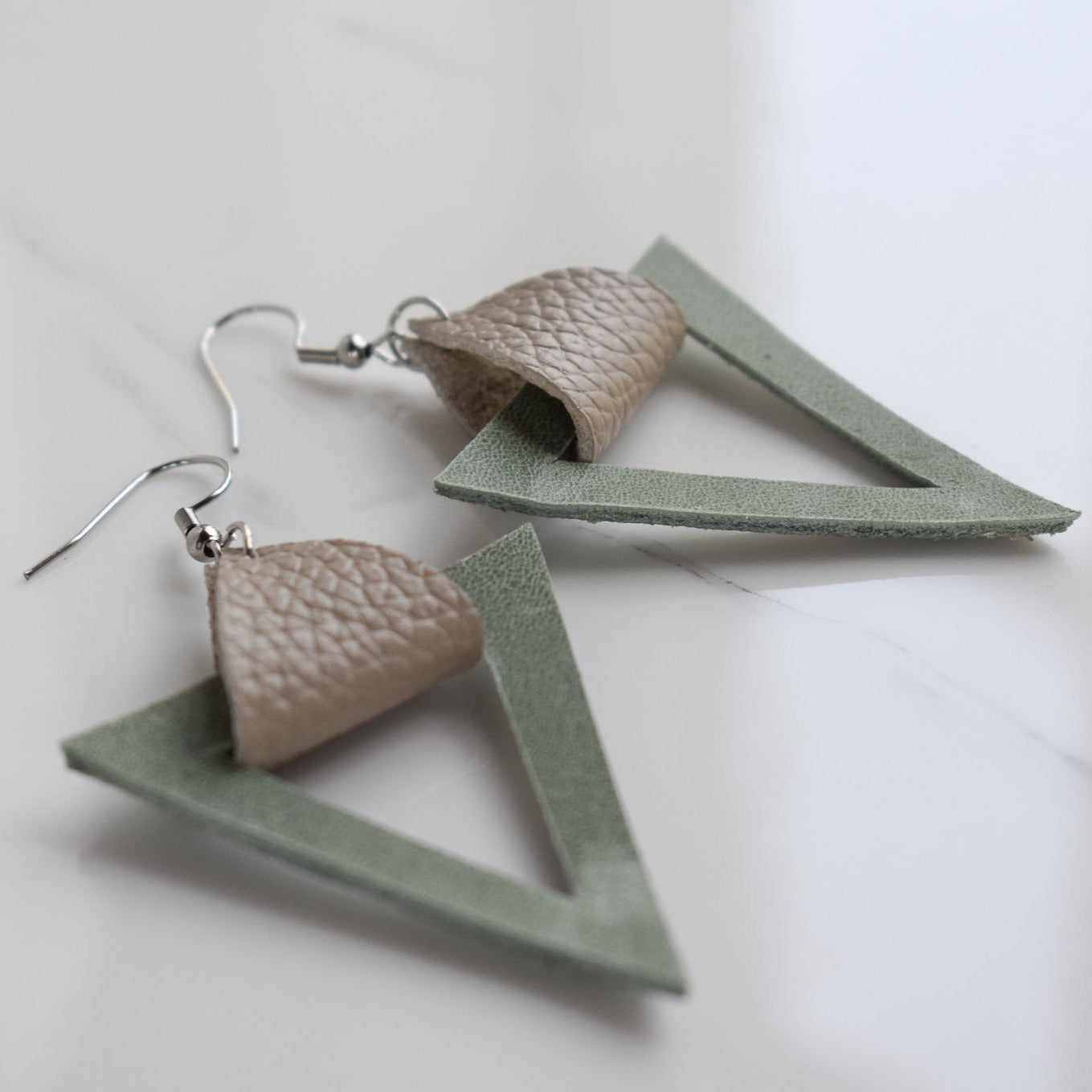 Handmade, light weight and comfortable to wear all day long leather earrings. All our earring hooks are made with a high quality stainless steel and they are hypo allergenic.  They will not tarnish or irritate your sensitive skin.