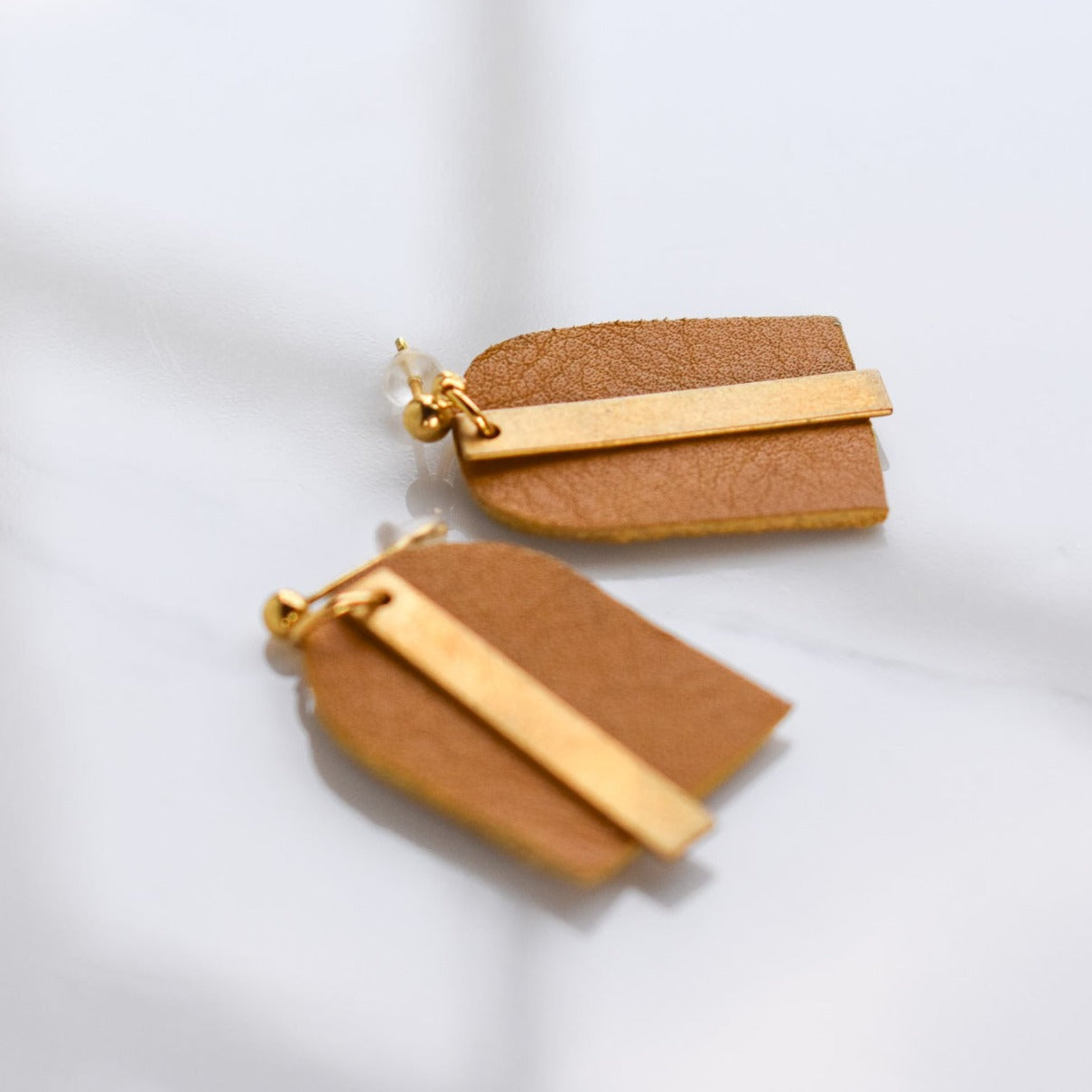 Handmade, light weight and comfortable to wear all day long leather earrings. All our earring hooks are made with a high quality stainless steel and they are hypo allergenic.  They will not tarnish or irritate your sensitive skin.
