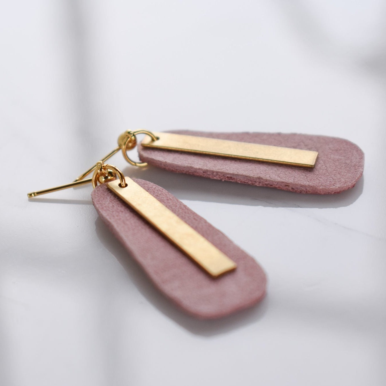 Handmade, light weight and comfortable to wear all day long leather earrings. All our earring hooks are made with a high quality stainless steel and they are hypo allergenic.  They will not tarnish or irritate your sensitive skin.